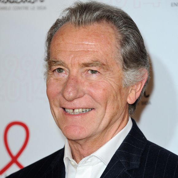 William Leymergie posant lors d'un photocall pour le lancement du Sidaction 2014 et du 'Sidaction 20e anniversaire' qui s'est tenu au Musée du quai Branly à Paris, France, le 10 mars 2014. Photo par Aurore Marechal/ABACAPRESS.COM