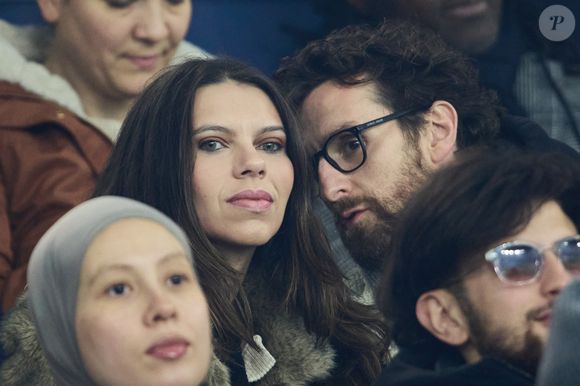 Pablo Mira et sa compagne Lisa Brunet dans les tribunes lors du match de Ligue Des Champions 2024-2025 (LDC) "PSG - Brest (7-0)" au Parc Des Princes, le 19 février 2025.
© Cyril Moreau/Bestimage