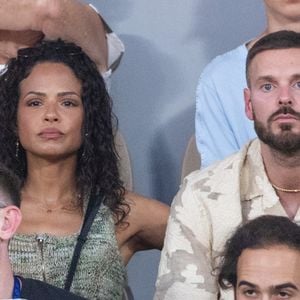 Matt Pokora (M. Pokora) et sa femme Christina Milian dans les tribunes lors des Internationaux de France de Tennis de Roland Garros 2026. Paris, le 25 mai 2026

© Moreau / Jacovides / Bestimage
