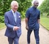 Aujourd’hui, il dirige sa propre fondation, Elba Hope Foundation, pour offrir à d’autres jeunes les mêmes chances...

Le roi Charles III d'Angleterre et Idris Elba, avec des jeunes portant le maillot de l'équipe de football d'Angleterre, qui sera en finale de l'Euro 2024, lors d'un événement pour The King’s Trust au palais Saint James à Londres. Le 12 juillet 2024 © Alpha Press / Bestimage