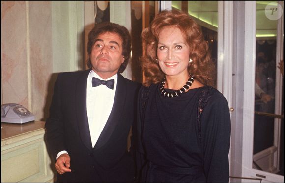 Orlando et la chanteuse Dalida lors d'une soirée à Paris en 1983. Crédit Bestimage