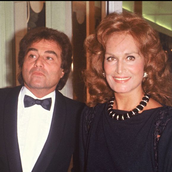 Orlando et la chanteuse Dalida lors d'une soirée à Paris en 1983. Crédit Bestimage