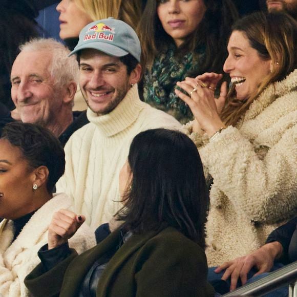 Just Riahd et sa femme, Angélique Angarni-Filopon (Miss France 2025), Laury Thilleman (Miss France 2011), Matthias Dandois dans les tribunes lors du match de Ligue Des Champions 2024-2025 (LDC) "PSG - Brest (7-0)" au Parc Des Princes, le 19 février 2025.
© Cyril Moreau/Bestimage
