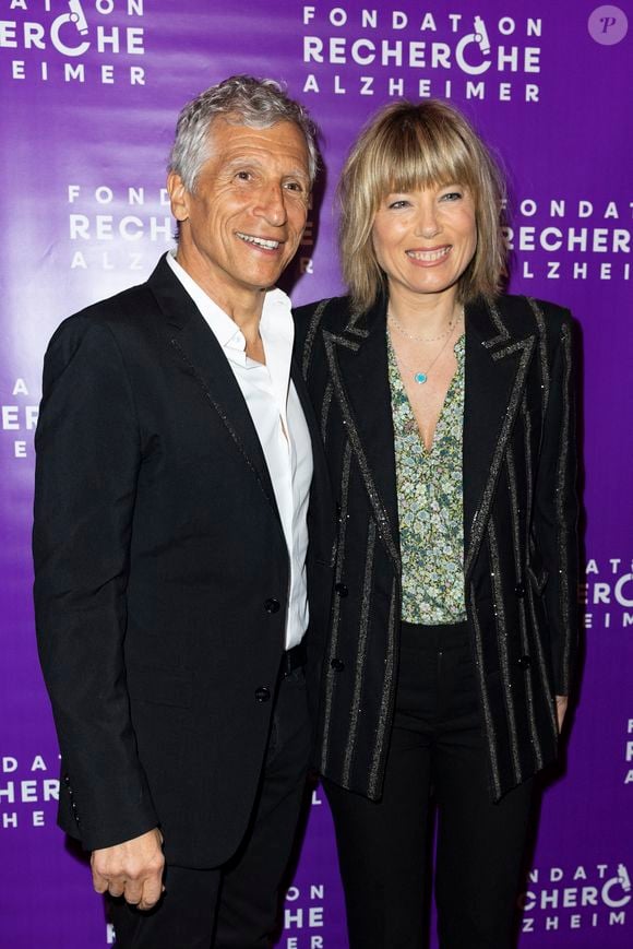 Nagui et sa femme Mélanie Page - Photocall du Gala de la Fondation Recherche Alzheimer placée sous le signe de l'émotion et du partage avec un concert unique sur le thème "2 générations chantent pour la 3ème" à l'Olympia à Paris le 17 mars 2025. © Olivier Borde - Bertrand Rindoff/Bestimage