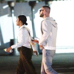 EXCLUSIF : Christina Milian et Matt Pokora ont été aperçus lors d'une rare soirée à Los Angeles. La chanteuse et actrice américaine de 44 ans était décontractée dans un chemisier blanc associé à un pantalon marron.
