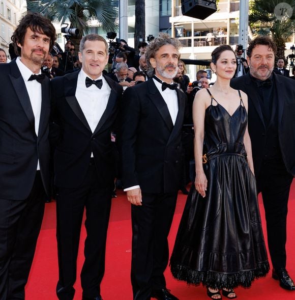 Simon Jacquet, Guillaume Canet, Leonardo Sbaraglia, Marion Cotillard, Denis Ménochet, Yodelice (Maxime Nouchy) - Montée des marches du film « Karma » lors du 79ème Festival International du Film de Cannes. © Jacovides-Moreau / Bestimage
