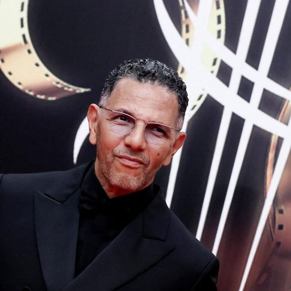 Roschdy Zem au photocall de la soirée d'anniversaire pour les 20 ans du Festival International du Film de Marrakech, Maroc, le 25 novembre 2023. © Dominique Jacovides/Bestimage