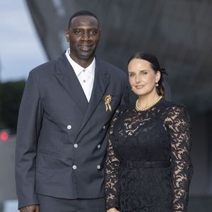 Omar Sy et sa Helene (bijoux Tasaki)  - Photocall du dîner "Prelude pour les JO" à la Fondation Vuitton à Paris, France, le 25 juillet 2024. © Olivier Borde/Bestimage