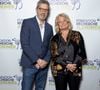 Michel Cymes, Marina Carrère d'Encausse au photocall du concert du gala des 20 ans de la fondation Recherche Alzheimer "2 générations chantent pour la 3ème" à l'Olympia à Paris le 18 mars 2024.
© Cyril Moreau / Bestimage