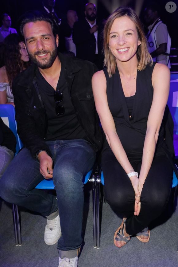 Maxim Nucci (Yodelice)  et sa compagne enceinte Isabelle Ithurburu - Maxim Nucci (Yodelice)  et sa compagne enceinte Isabelle Ithurburu assistent au match de boxe de Tony Yoka au palais des sports de Paris, le 23 juin 2018 © Veeren-CVS/Bestimage