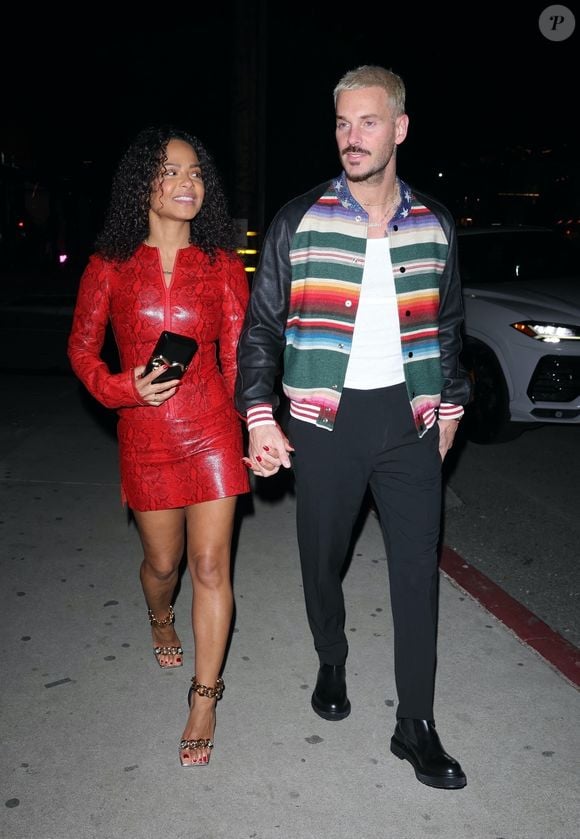 BGUK_2807586 - Los Angeles, CA  - Christina Milian arrived to dinner in a red snake skin print  dress with her husband Matt Pokora  at Catch Steak LA in West Hollywood.



Pictured: Christina Milian