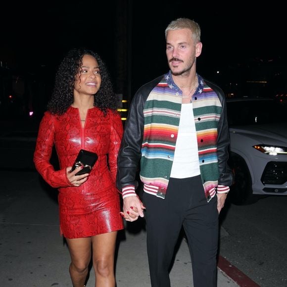 BGUK_2807586 - Los Angeles, CA  - Christina Milian arrived to dinner in a red snake skin print  dress with her husband Matt Pokora  at Catch Steak LA in West Hollywood.



Pictured: Christina Milian