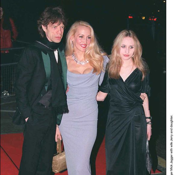 © LFI/ABACA. 35352-1. Le chanteur Mick Jagger avec son épouse Jerry et leur fille Georgia en 2002.