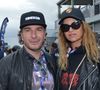 L’anecdote a été évoquée récemment dans les médias.

Michaël Youn et sa compagne Isabelle Funaro lors des "24H du Mans 2024", le 15 juin 2024. © Rachid Bellak/Bestimage
