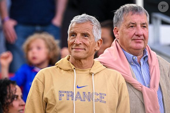 L'animateur de télévision français NAGUI Fam assiste au match de l'UEFA Nations League entre l'Espagne et la France à la Mercedes-Benz Arena le 5 juin 2025 à Stuttgart, en Allemagne. Photo par Baptiste Fernandez/Icon Sport/ABACAPRESS.COM