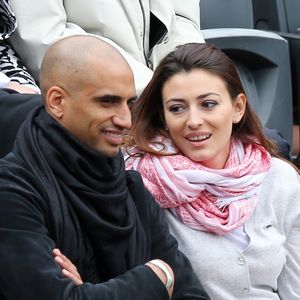 Aurelien Capoue et sa femme Rachel Legrain-Trapani - People aux Internationaux de France de tennis de Roland Garros à Paris, le 28 mai  2014 lors du match entre Jo-Wilfried Tsonga et Jürgen Melzer.