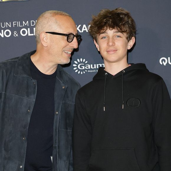 Gad Elmaleh et son fils Raphaël - Première du film "Juste une illusion" au cinéma Le Grand Rex à Paris le 22 mars 2026. © Coadic Guirec/Bestimage