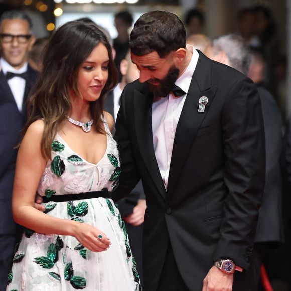 Karim Benzema et sa compagne Lyna Khoudri à la descente des marches du film « 13 jours 13 nuits » lors du 78e Festival International du Film de Cannes le 23 mai 2025
© Jacovides-Moreau / Bestimage