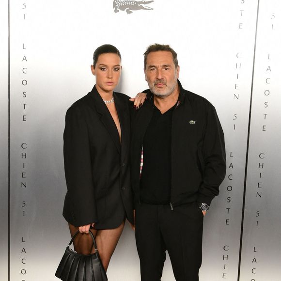 Adèle Exarchopoulos et Gilles Lellouche au photocall de la soirée Lacoste X Chien 51 au club Silencio en marge du 78ème Festival International du Film de Cannes, France, le 18 mai 2025. © Romain Doucelin/Bestimage