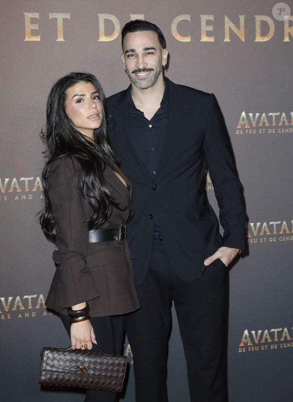 Adil Rami et sa compagne Louana Franco - Avant-première du film "Avatar : de Feu et de Cendres" à la Seine Musicale de Boulogne-Billancourt le 5 décembre 2025. 
Photo par Marc Ausset-Lacroix/Bestimage
