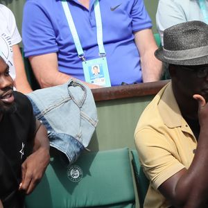 Lilian Thuram et son fils Marcus Thuram - People dans les tribunes lors des Internationaux de France de Tennis de Roland-Garros à Paris le 2 juin 2018.
© Dominique Jacovides-Cyril Moreau / Bestimage