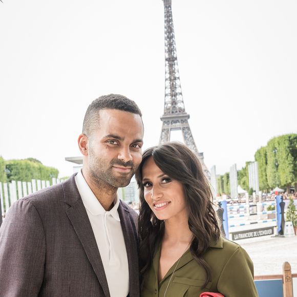 Exclusif - Tony Parker et sa femme Axelle Francine - People lors du Longines Paris Eiffel Jumping au Champ-de-Mars à Paris, le 5 juillet 2015.