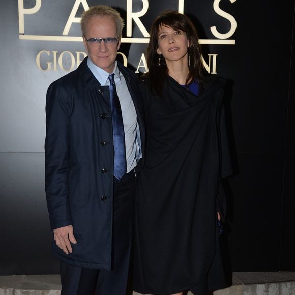 Sophie Marceau etChristophe Lambert - Arrivee des people au defile Giorgio Armani Haute Couture Printemps/Ete 2014 au Palais de Tokyo a Paris, le 21 janvier 2014. © VEEREN / BESTIMAGE