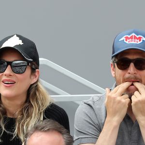 Marion Cotillard et Guillaume Canet - People dans les tribunes lors de la finale messieurs des internationaux de France de tennis de Roland Garros 2019 à Paris le 9 juin 2019. © Jacovides-Moreau/Bestimage