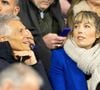 Nagui et sa femme Mélanie Page - Célébrités dans les tribunes du quart de finale de la Ligue des Nations de l'UEFA 2025 "France - Croatie (2-0 / tab 5-4)" au Stade de France à Saint-Denis le 23 mars 2025. © Cyril Moreau/Bestimage