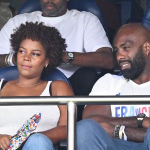Teddy Riner et sa femme Luthna Plocus en tribunes pendant l'épreuve finale de football opposant la France à l'Espagne lors des Jeux Olympiques de Paris 2024 (JO) au Parc des Princes, à Paris, France, le 9 août 2024. © Jacovides-Perusseau/Bestimage