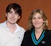Fils aîné du chanteur et comédien Patrick Bruel et de l’écrivaine Amanda Sthers, Oscar s’inscrit dans une dynamique familiale où création artistique et sens des affaires cohabitent depuis toujours.

Amanda Sthers et son fils Oscar Bruel au village (night session) lors des Internationaux de France de tennis de Roland Garros 2024, à Paris, France. © Jacovides-Moreau/Bestimage