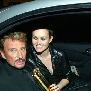 Laeticia et Johnny Hallyday lors des NRJ Music Awards de 2003 à Cannes - © Dominique Jacovides - Bestimage