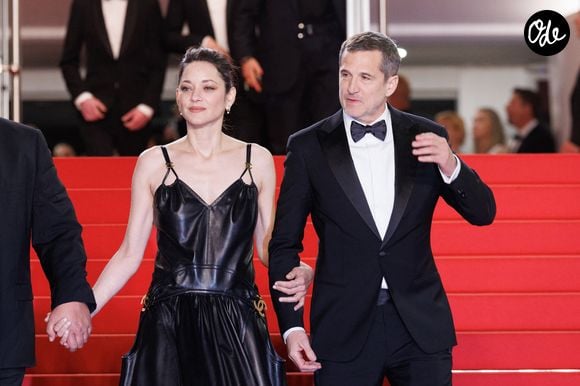 Marion Cotillard et Guillaume Canet - Descente des marches du film « Karma » lors du 79ème Festival International du Film de Cannes, le 15 mai 2026. © Jacovides-Moreau / Bestimage