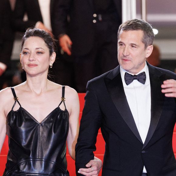 Marion Cotillard et Guillaume Canet - Descente des marches du film « Karma » lors du 79ème Festival International du Film de Cannes, le 15 mai 2026. © Jacovides-Moreau / Bestimage
