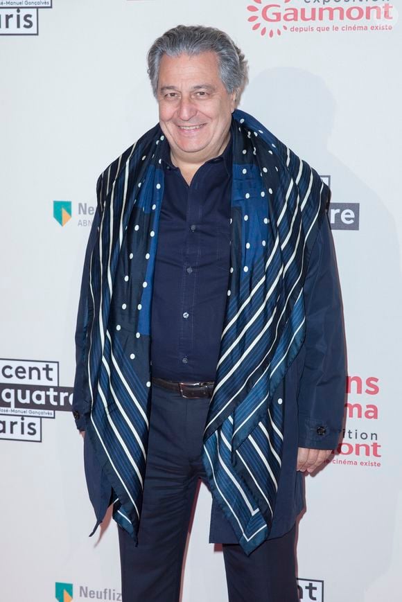 Christian Clavier - Photocall de l'exposition "120 ans de Cinéma: Depuis que le Cinéma existe" au 104 à Paris le 13 avril 2015.