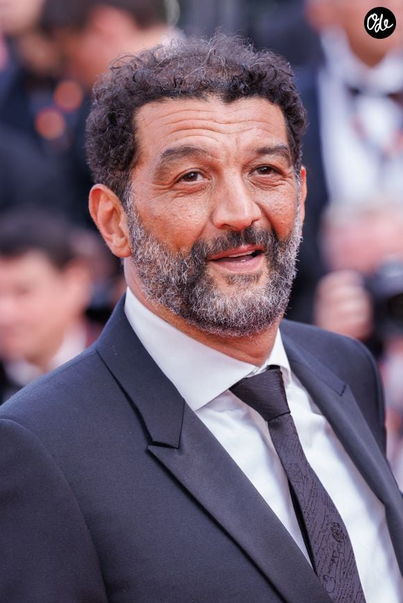 Ramzy Bedia participe au tapis rouge du film « The Phoenician Scheme » lors du 78e Festival de Cannes, au Palais des Festivals, le 18 mai 2025 à Cannes, en France. Photo : Anne Barson/ABACAPRESS.COM