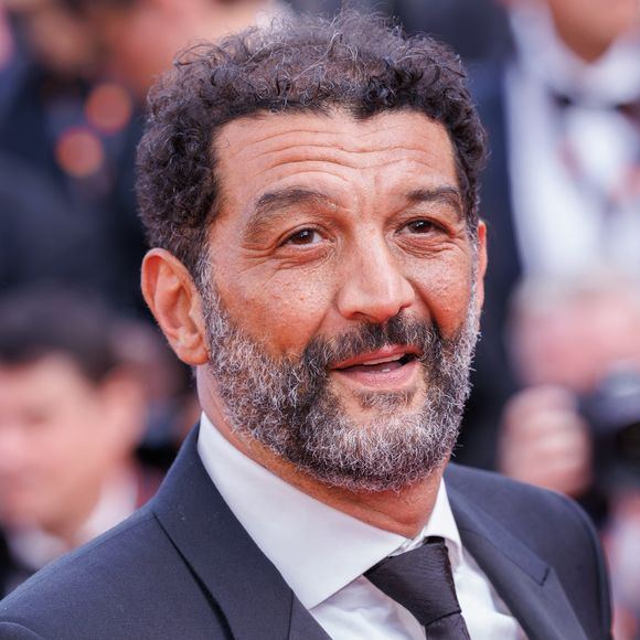 Ramzy Bedia participe au tapis rouge du film « The Phoenician Scheme » lors du 78e Festival de Cannes, au Palais des Festivals, le 18 mai 2025 à Cannes, en France. Photo : Anne Barson/ABACAPRESS.COM