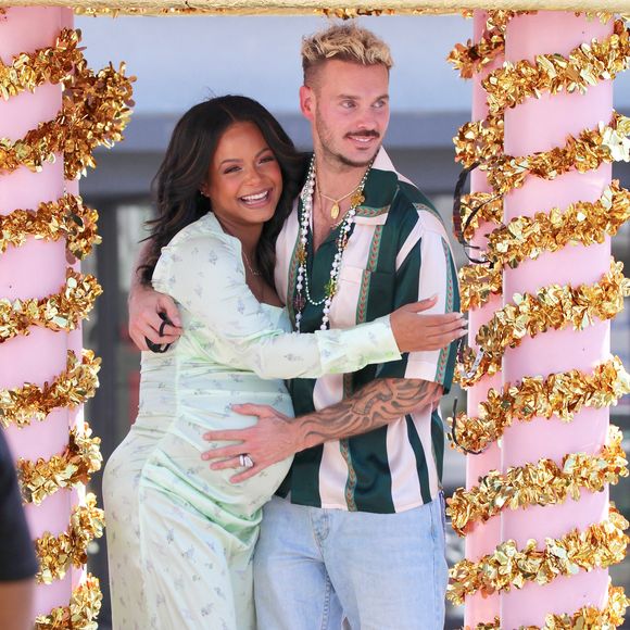 Dans cette publication, Christina Milian apparaît en pleine fête, entourée de ses proches.

Christina Milian, enceinte,  fait la promotion de son food truck Beignet Box lors d'une parade à Los Angeles avec son compagnon M Pokora (Matt) le 10 avril 2021. The ImageDirect / Bestimage