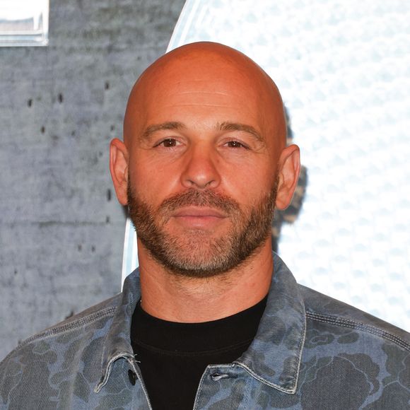 Il confie : "En faisant du tri chez moi, je me suis rendu compte que j'ai autant de baskets et elles ne sont pas toutes là, ce n'est pas très normal. Ce n'est pas très normal parce que c'est dû à des traumatismes de quand t'étais ado et que t'avais une paire par an que tu défonçais, que t'avais honte après"

Franck Gastambide - Avant-première de la série "Validé" saison 3 au cinéma le Grand Rex à Paris le 3 novembre 2025. © Coadic Guirec/Bestimage