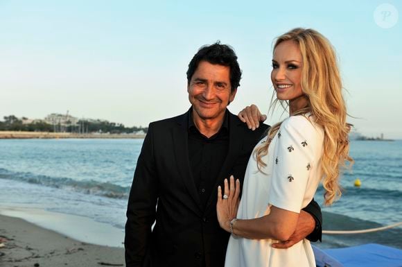 Adriana Karembeu et son ex-mari André Aram Ohanian - Adriana est l'invitée d'honneur de la soirée caritative pour soutenir les associations RMC/BFM et Rayon de Soleil de Cannes, à l'occasion des 10 ans de la Plage Z du Grand Hyatt Hotel Martinez à Cannes le 27 juin 2014. Cette soirée est organisée par le magazine Try Me et l'Hôtel Martinez. Égérie de la marque Atol les Opticiens, Adriana portera le nouveau modèle de sa ligne orné de diamants sur ses branches.  Cannes le 27 juin 2014
