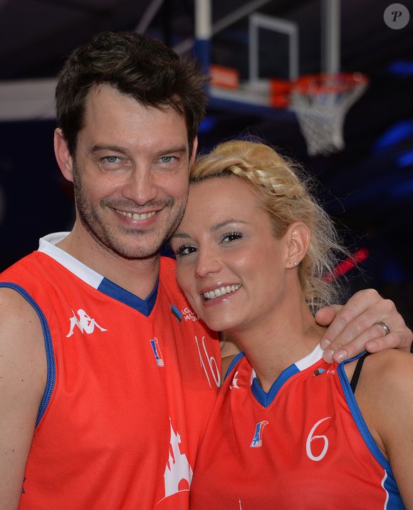 Elodie Gossuin et son mari Bertrand Lacherie - Match des célébrités (défi AG2R La Mondiale) au profit de l'association "Petits Princes" dans le cadre de la Disneyland Paris Leaders Cup LNB, compétition de basket qui réunit les 8 meilleures équipes de PRO A à la Disney Events Arena, le 20 février 2016. © Veeren/Bestimage