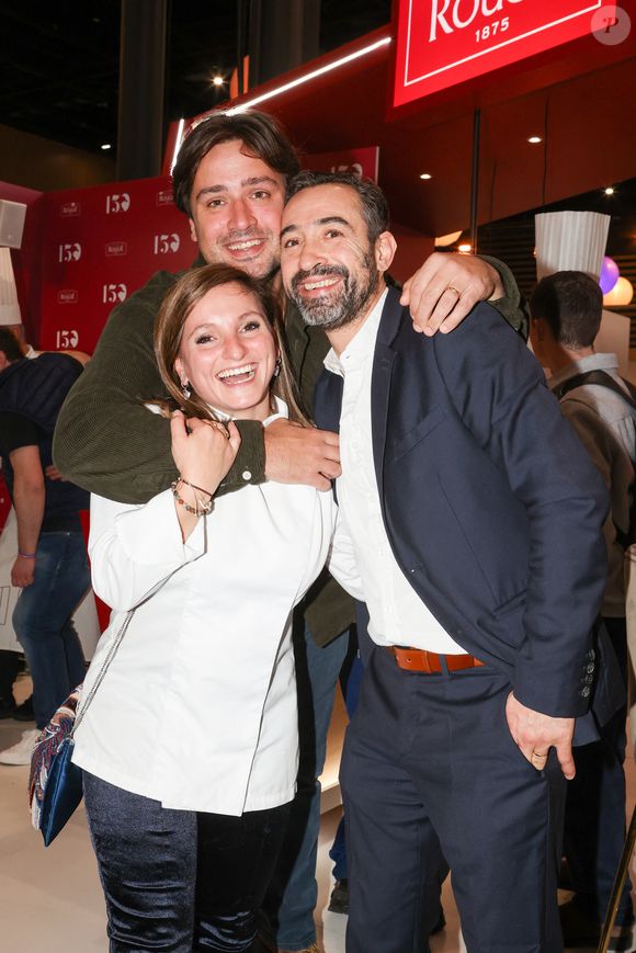 Elle admet cependant pour "Lou Media" que la vie de couple n’est pas toujours simple, surtout depuis l’arrivée de leurs enfants.

La Cheffe Noémie Honiat, son mari Quentin Bourdy et Le chef Pierre Augé - Les "Bocuse d'Or 2025" au Parc des Expositions Eurexpo à Lyon le 26 janvier 2025. © Jean-Marc Lhomer/ Bestimage
