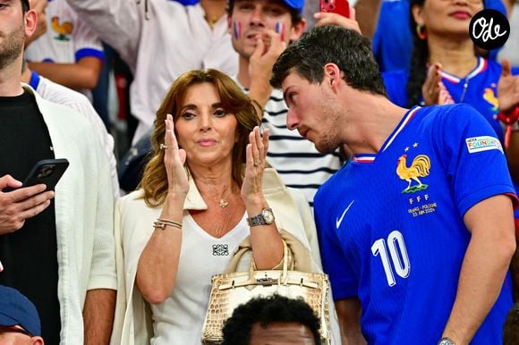 Claude Deschamps et Dylan Deschamps dans les tribunes de la demi-finale du Championnat d'Europe de football (Euro 2024) entre l'Espagne et la France (2-1) à Munich, Allemagne, le 9 juillet 2024. © Bestimage