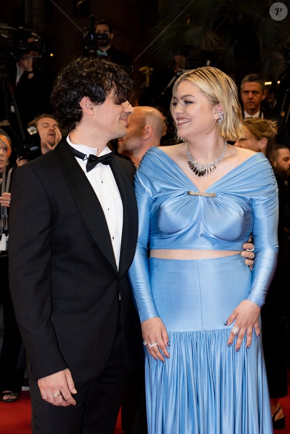 A savoir Budapest.

Florian Rossi et sa compgane Louane Emera - Montée des marches du film " The Idol " lors du 76ème Festival International du Film de Cannes, au Palais des Festivals à Cannes. Le 22 mai 2023
© Jacovides-Moreau / Bestimage