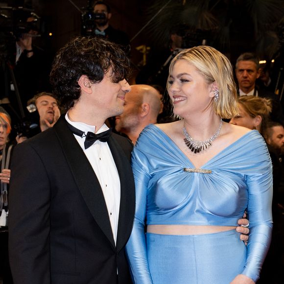 A savoir Budapest.

Florian Rossi et sa compgane Louane Emera - Montée des marches du film " The Idol " lors du 76ème Festival International du Film de Cannes, au Palais des Festivals à Cannes. Le 22 mai 2023
© Jacovides-Moreau / Bestimage