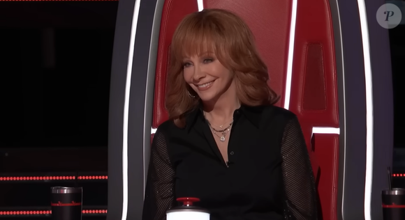 À l'époque il avait rejoint la team de Reba McEntire. 

Capture The Voice USA - Youtube