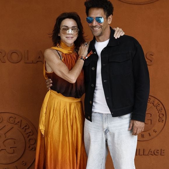 Tomer Sisley et sa femme Sandra lors des Internationaux de France de Tennis de Roland Garros 2026, à Paris, France, le 7 juin 2026. © Jacovides-Moreau/Bestimage