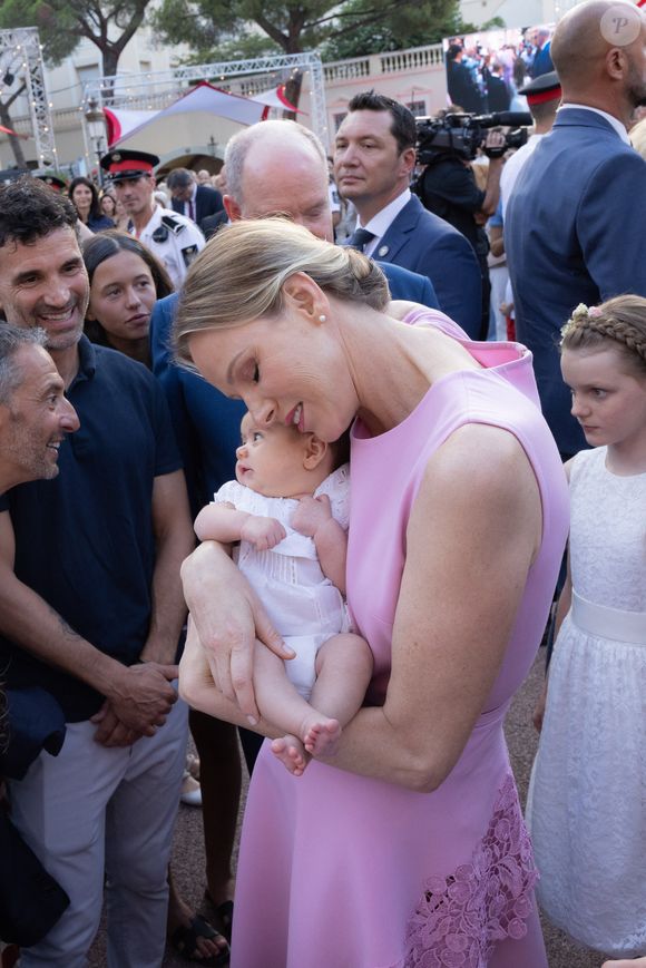 Le prince Albert II de Monaco, la princesse Charlene et leurs enfants, le prince héréditaire Jacques et la princesse Gabriella - Célébration des 20 ans de règne du prince souverain Albert II de Monaco sur la place du Palais à Monaco, le 19 juillet 2025. © Olivier Huitel/Pool Monaco/Bestimage