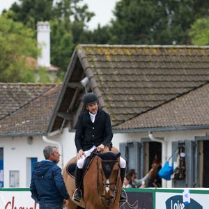 Guillaume Canet participe au Jumping International de la Baule sur son cheval James Bond du Bec le 10 juin 2023.

© Laetitia Notarianni / Bestimage