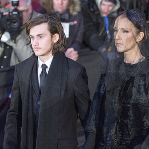 Celine Dion quitte l'église avec ses enfants, René-Charles, Eddy et Nelson après les funérailles de son mari René Angelil, à la Basilique Notre-Dame, vendredi 22 janvier 2016 à Montréal.
